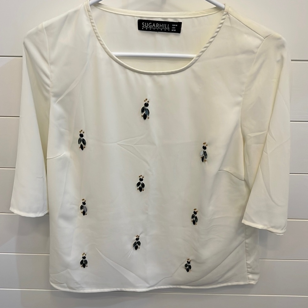 Short sleeve beaded top size 6